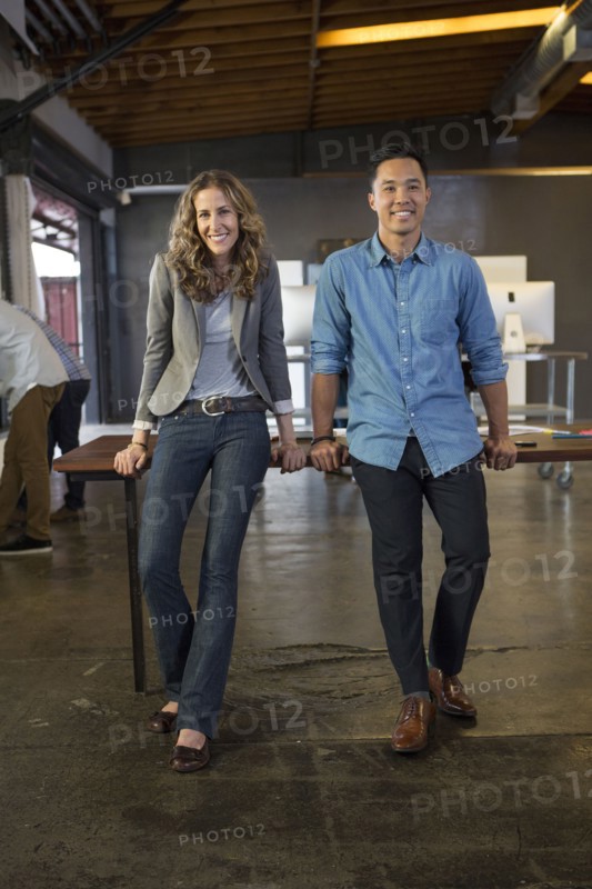 Business people smiling in office