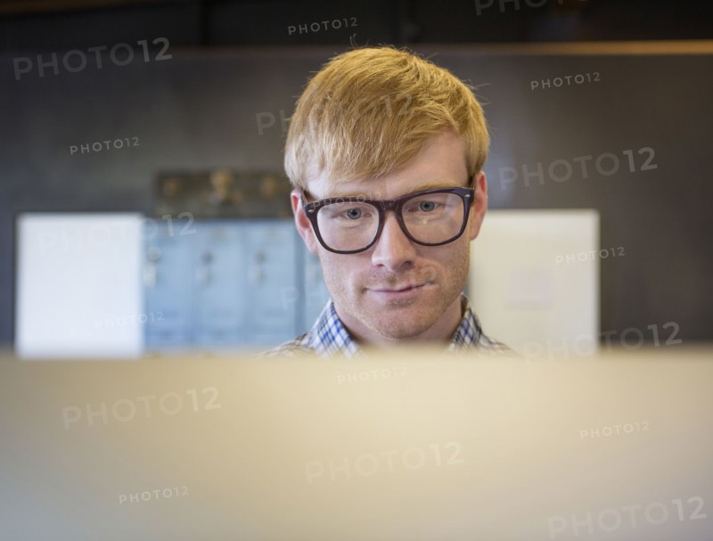 Caucasian businessman working on computer