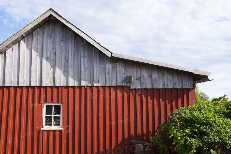 Building siding under clouds