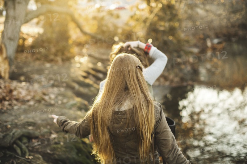 Caucasian women walking in park