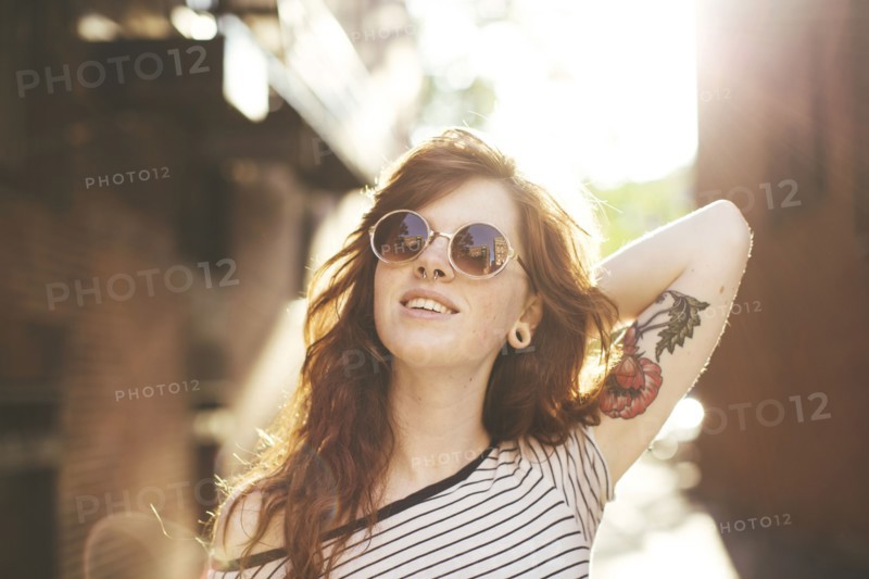 Caucasian woman posing in city