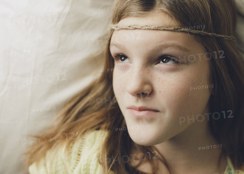 Caucasian girl wearing braid headband