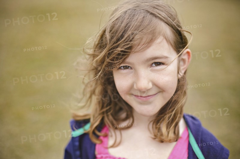 Close up of smiling Caucasian girl