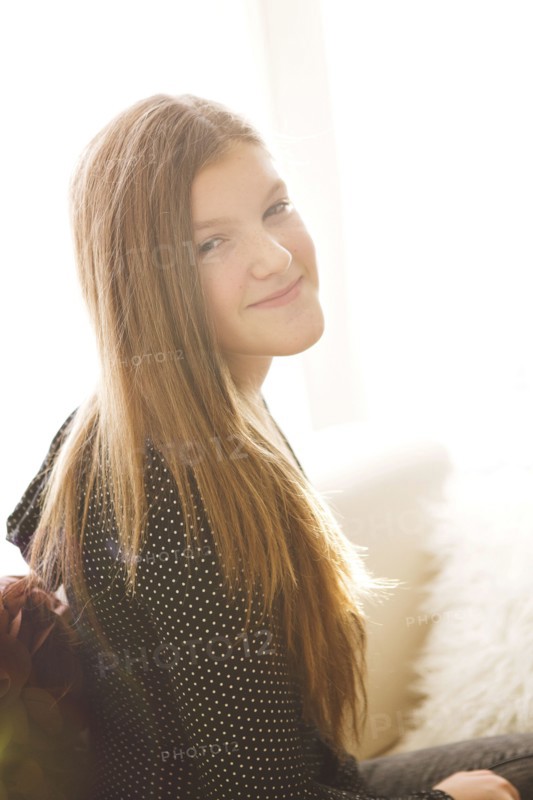 Smiling Caucasian girl with long hair