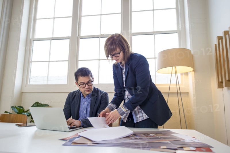 Business people working at desk in office