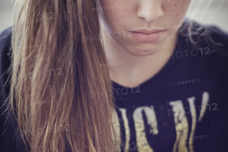 Sad Caucasian teenage girl