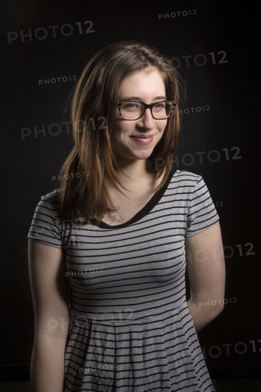 Close up of smiling Caucasian woman wearing eyeglasses