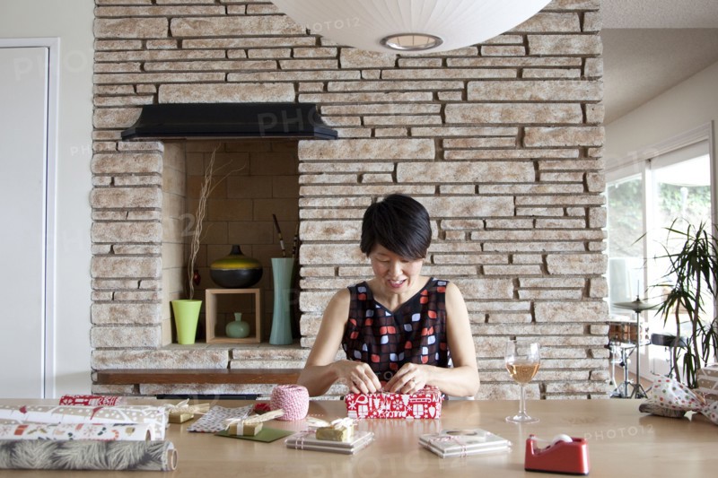Japanese woman wrapping gifts