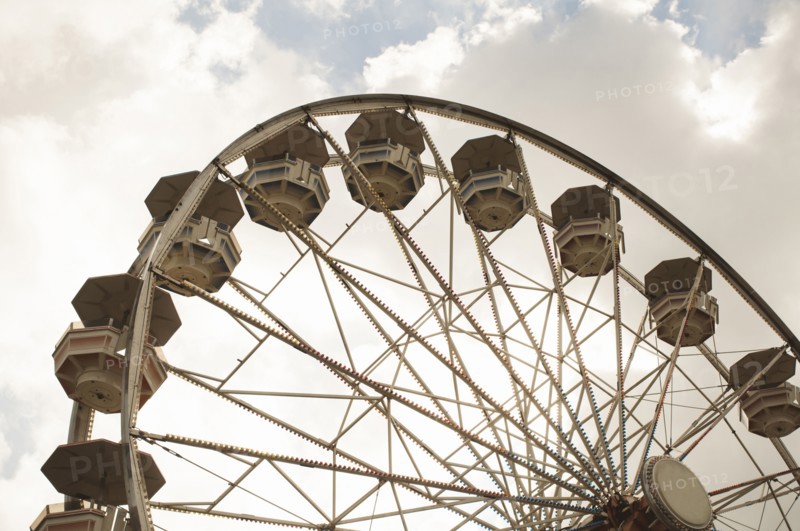 Low angle view of ferris wheel at amusement park