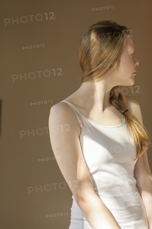 Girl looking over her shoulder