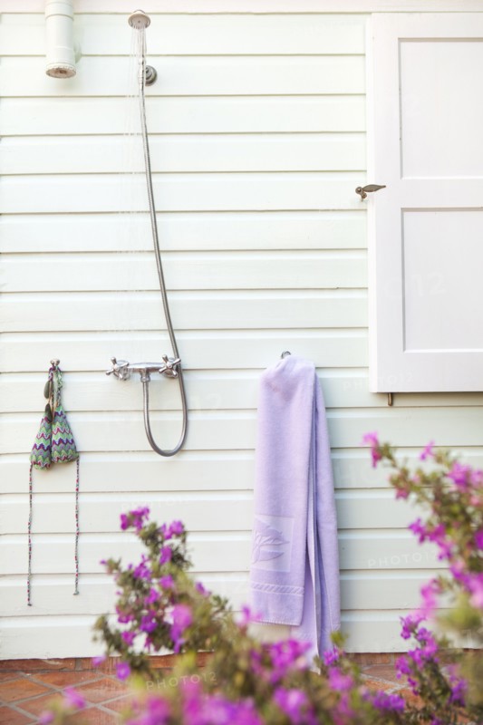 Outdoor shower in backyard