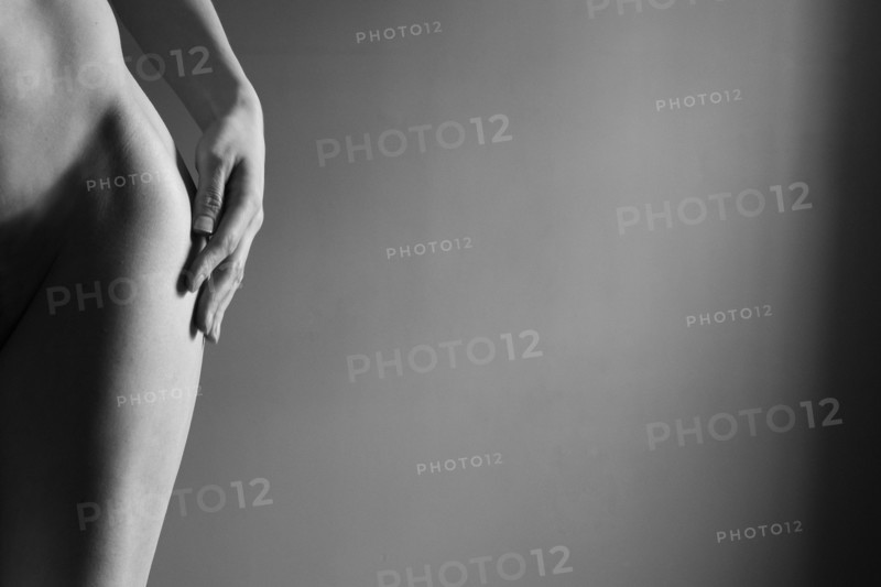 Close up of hip and leg of nude Caucasian woman