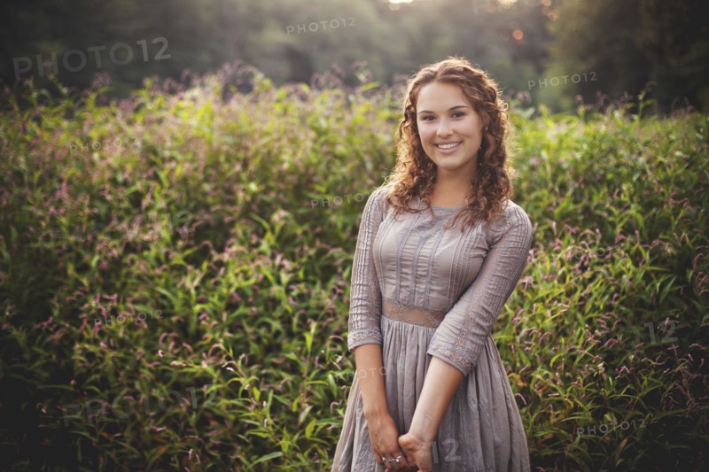 Woman smiling in rural field