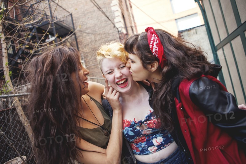 Friends playing in city