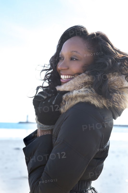 Close up of smiling woman wearing coat