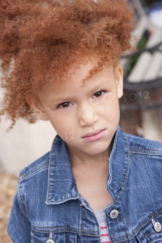 Close up of angry girl frowning
