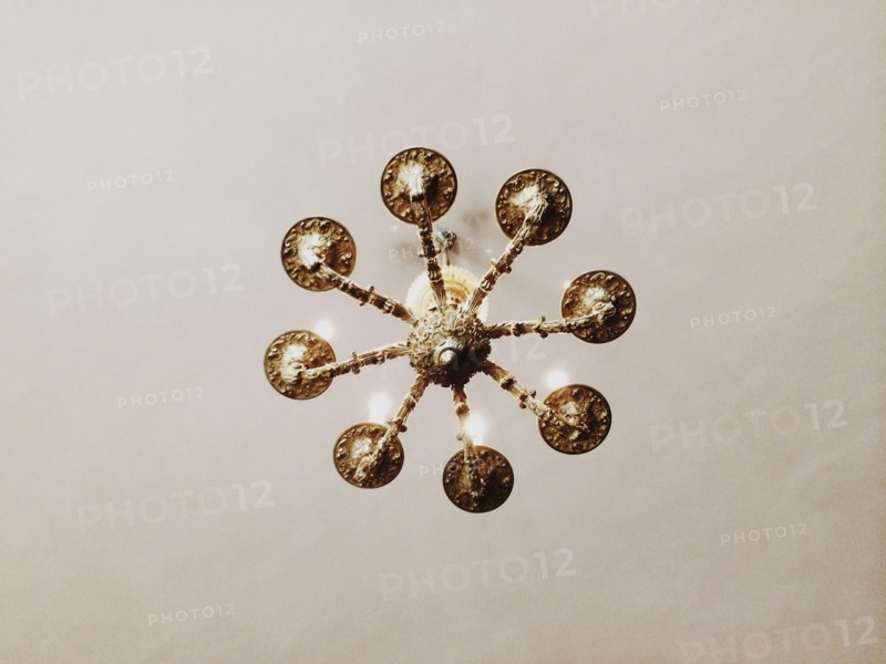 Low angle view of chandelier hanging from ceiling