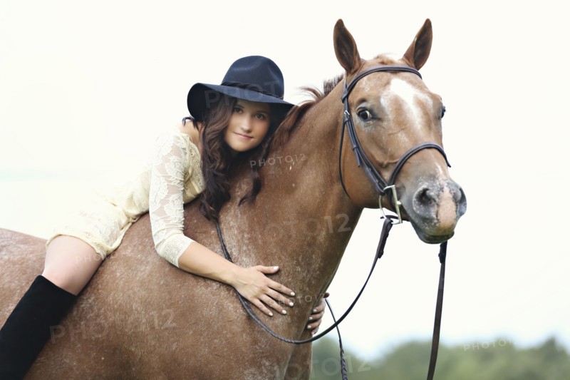 Woman riding horse