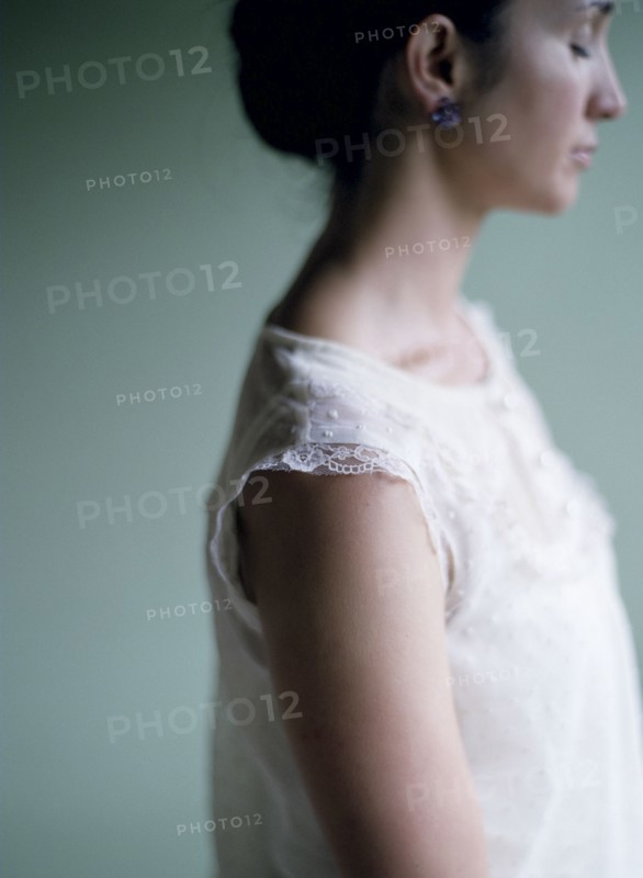 Close up profile of woman with eyes closed