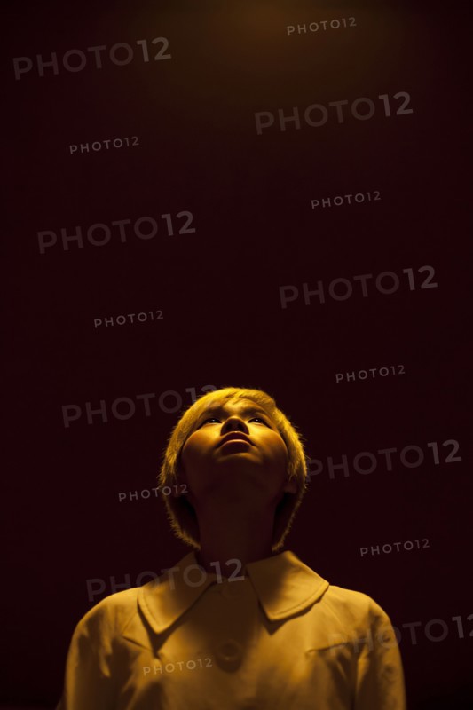 Asian woman looking up