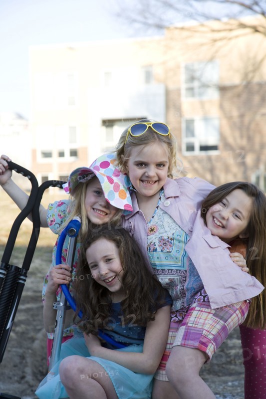 Smiling girls playing in park