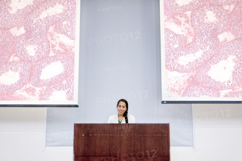 Armenian doctor speaking at podium