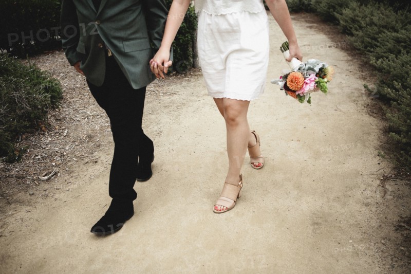 Japanese newlywed couple walking outdoors