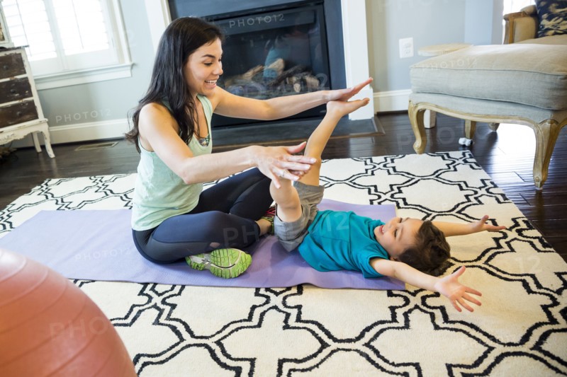 Mother and son playing on floor