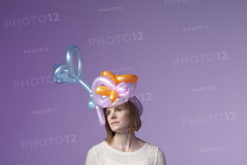 Woman wearing balloon hat