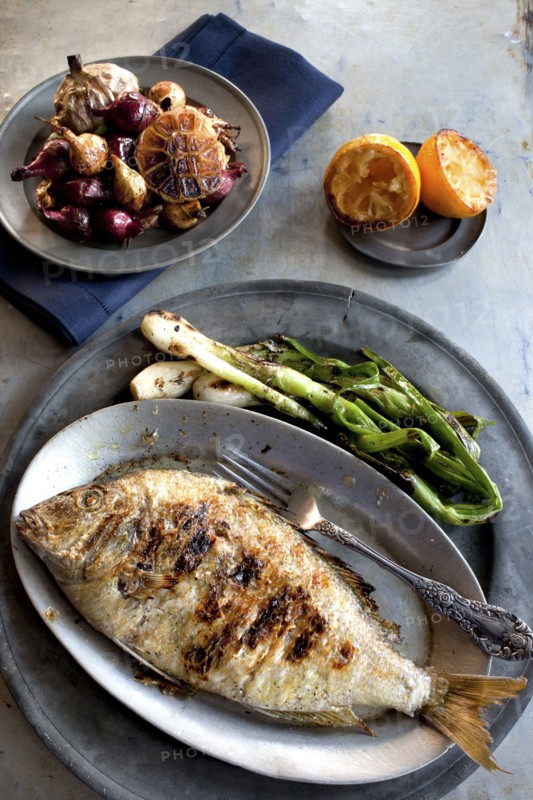 Plates of grilled fish