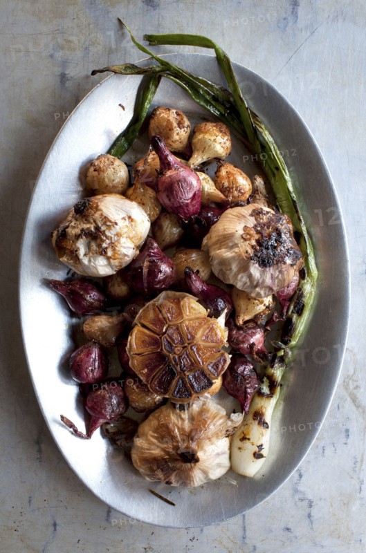 Plate of roast vegetables and garlic
