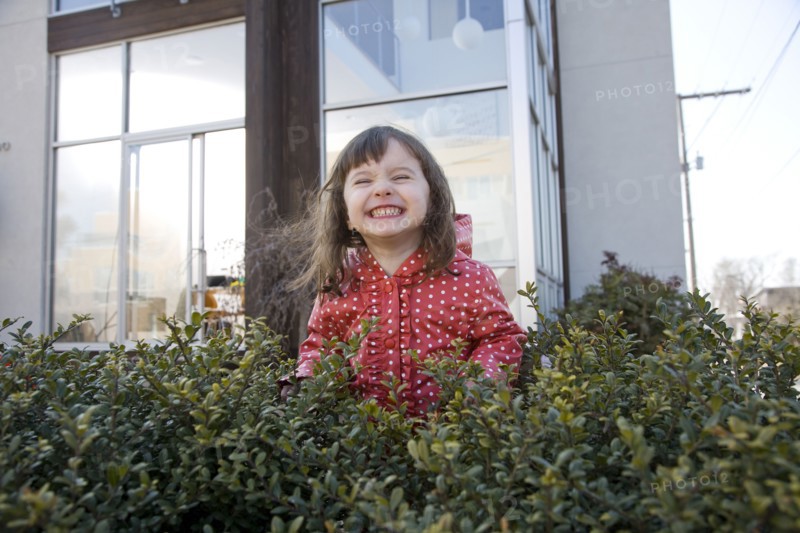 Caucasian girl smiling in bush