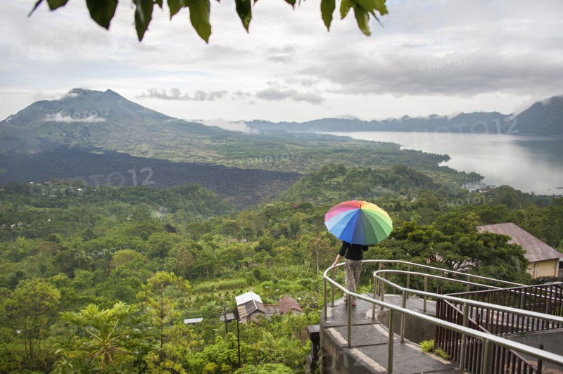 Caucasian tourist admiring scenic view of jungle