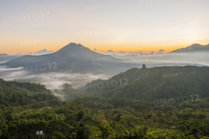 Hilltops over morning fog in remote landscape