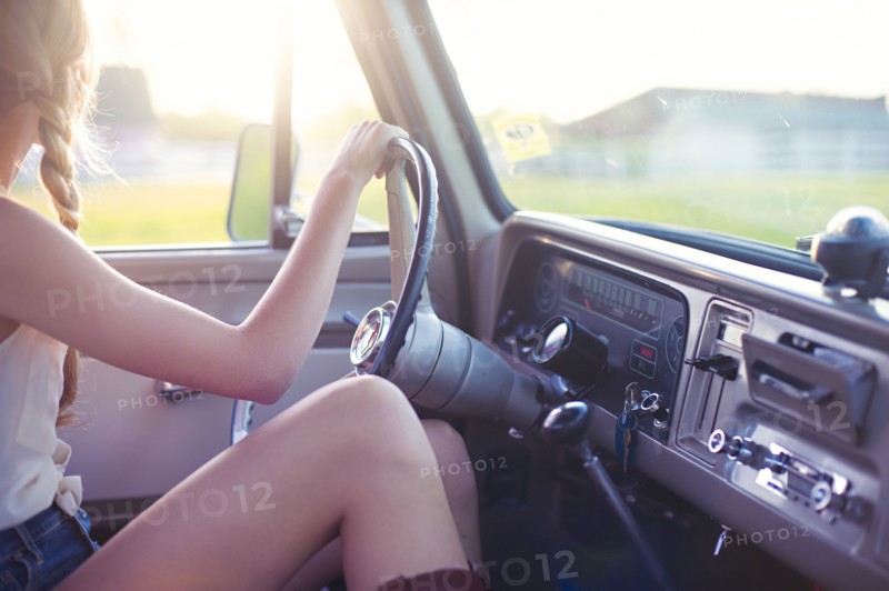 Caucasian woman driving car