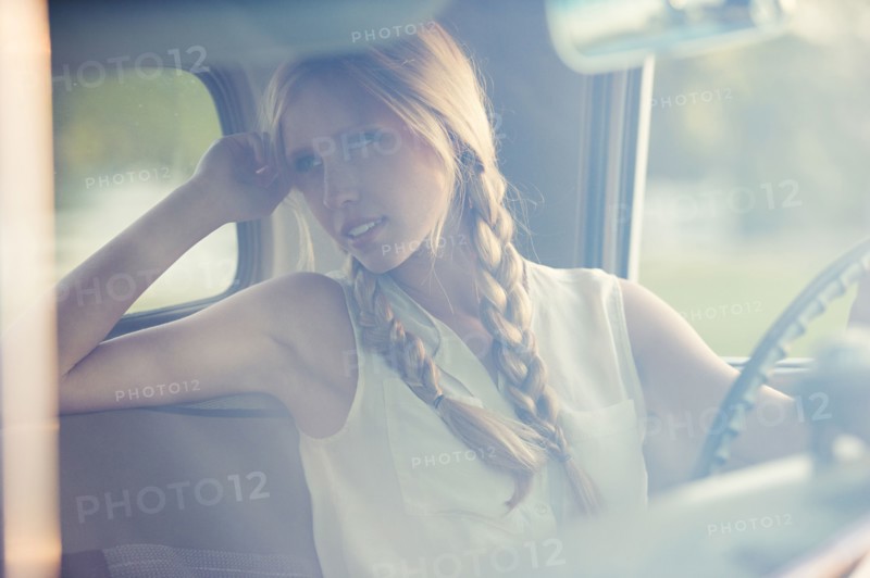 Caucasian woman driving car