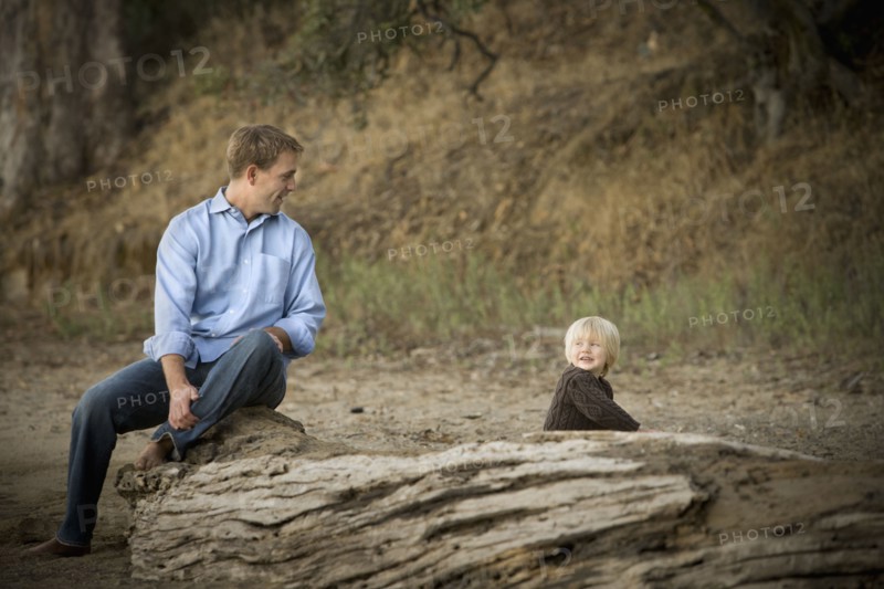 Caucasian father and son enjoying park