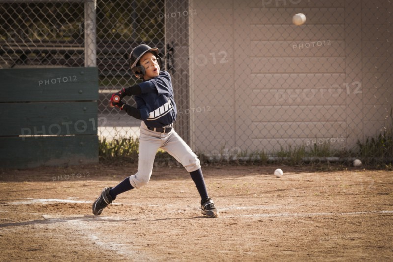 African American boy playing baseball