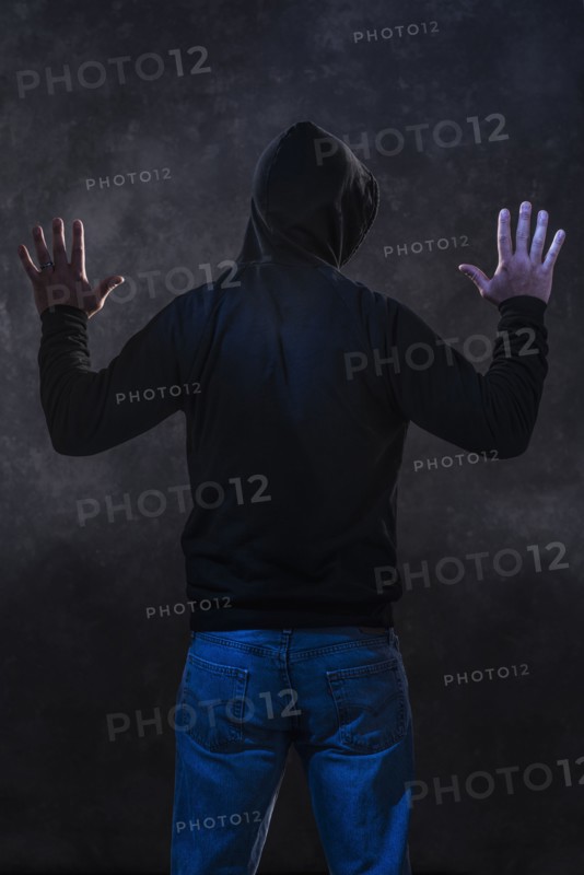 Caucasian man wearing black hoodie