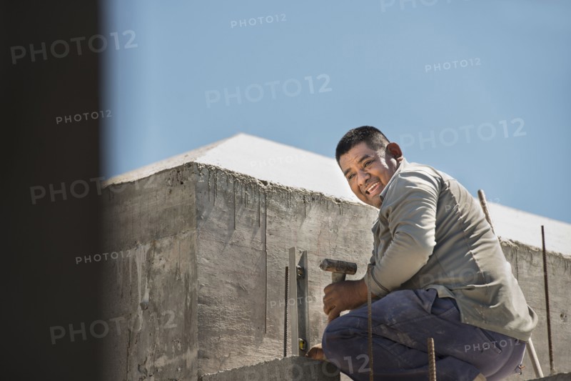Hispanic construction worker at construction site