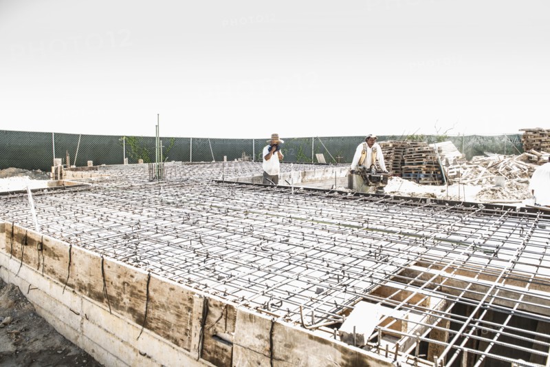 Hispanic construction workers at construction site