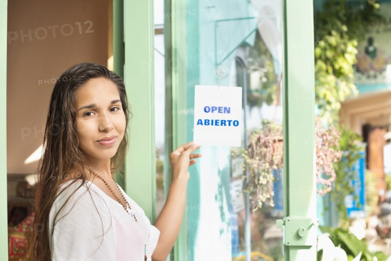 Hispanic business owner opening shop