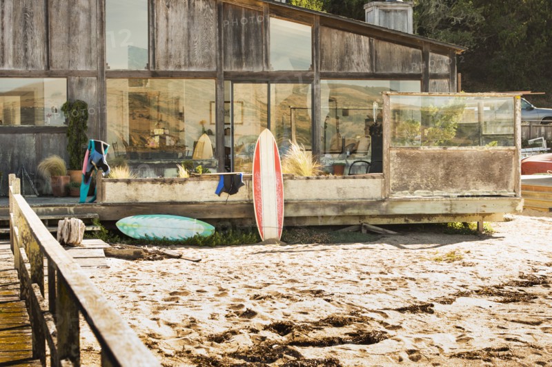 Surfboards in backyard of beach house
