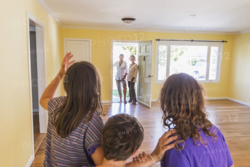 Family admiring new home