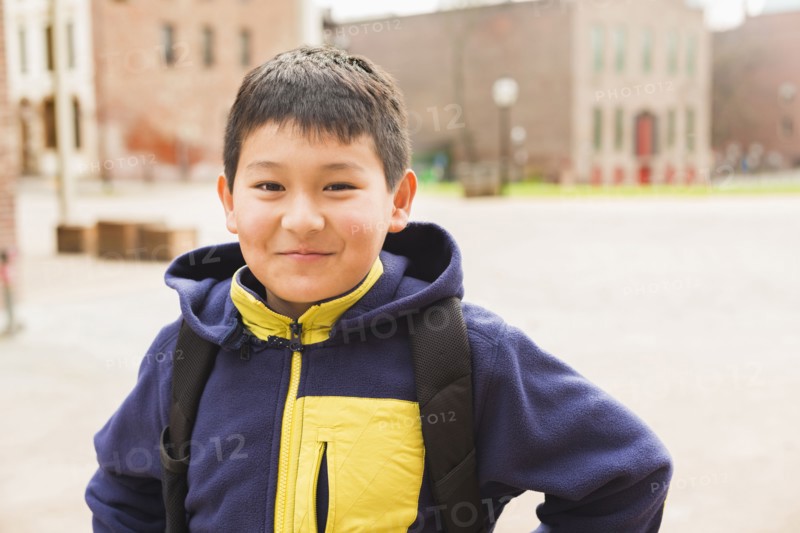 Hispanic boy smiling outdoors