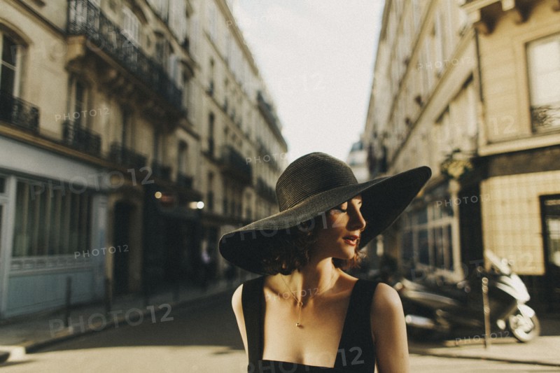 Glamorous Caucasian woman standing in city street