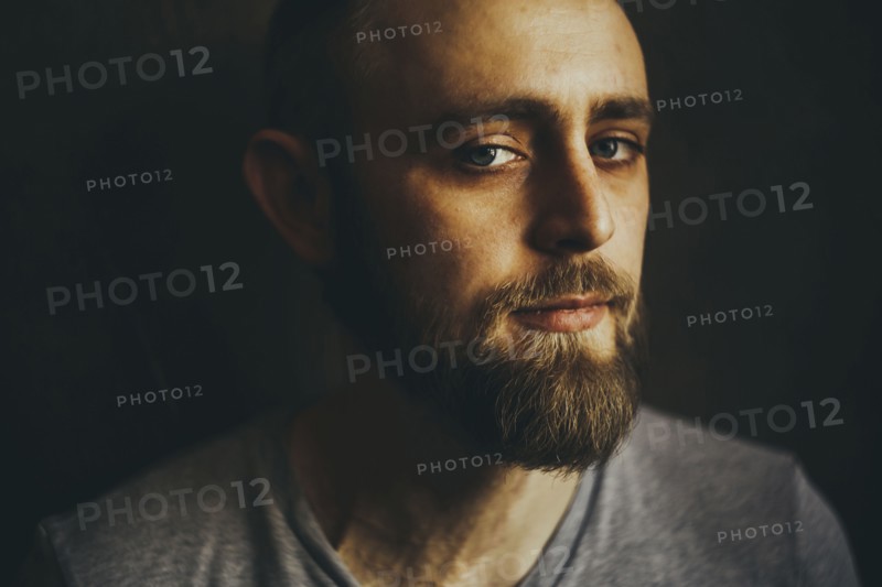 Portrait of serious Caucasian man with beard