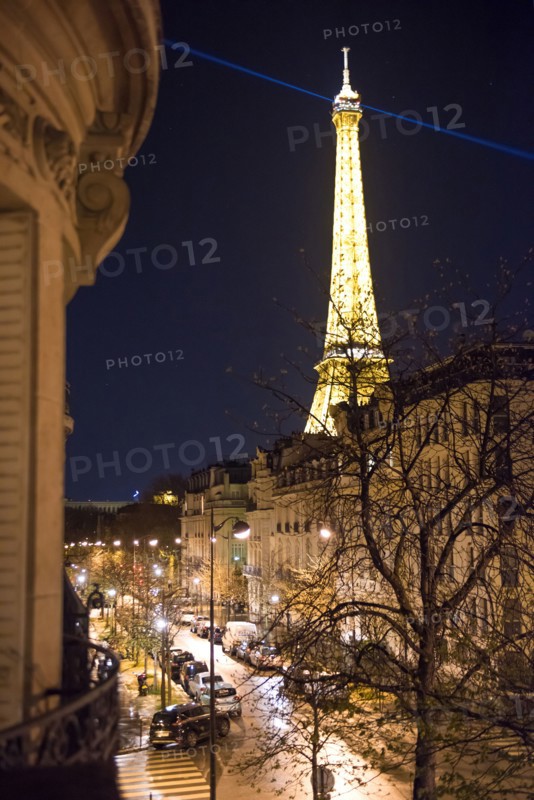 Eiffel tower illuminated at night