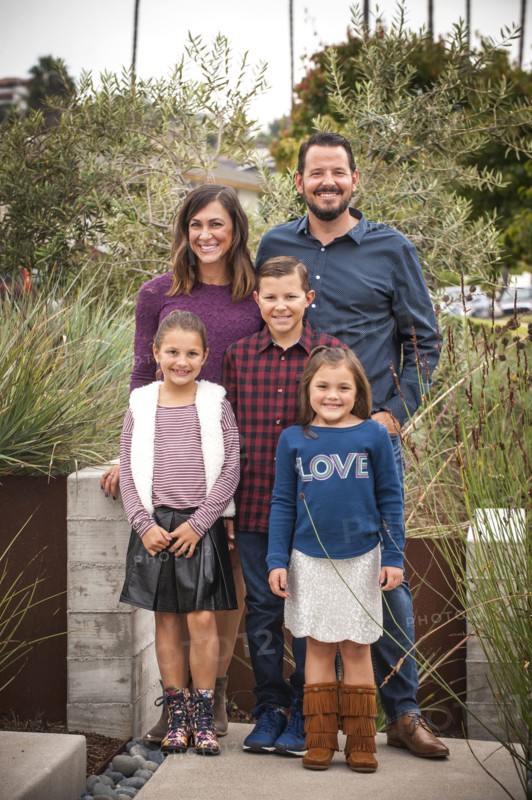 Portrait of smiling family in garden