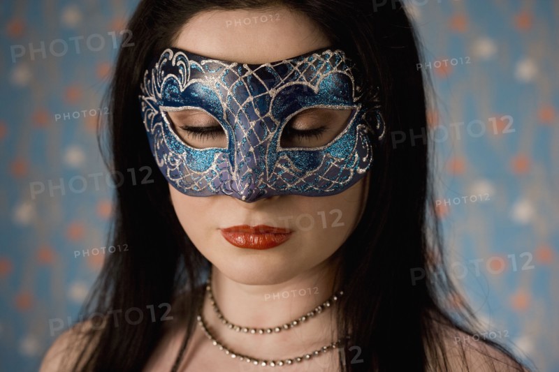 Middle Eastern woman in mask